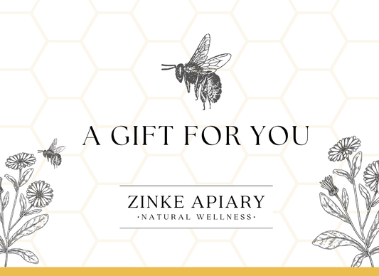 Gift card design for Zinke Apiary with bee and floral illustrations on a hexagonal pattern background.